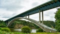 Motorway bridge over the river, in a green landscape Royalty Free Stock Photo