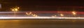 The motorway at night. The car moves at fast speed at the night. Blured road with lights with car on high speed Royalty Free Stock Photo