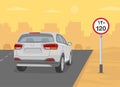 Motorway speed limit road or traffic sign. Back view of white suv on desert road. Royalty Free Stock Photo