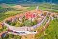 Motovun. Aerial view of idyllic hill town of Motovun surrounded by defense stone walls and Mirna river valley