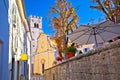 Motovun. Old cobbled street and church in historic town of Motovun Royalty Free Stock Photo