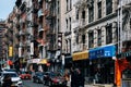 Mott street view in china town with lots of chinese signs in Lower Manhattan Royalty Free Stock Photo