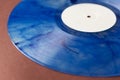 A mottled blue vinyl record