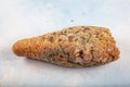 Mouldy moldy bread. Mould growing old bread on wooden table. Wastage of bread and stale bread