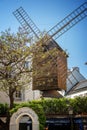 Moulin de la Galette, famous restaurant and old wooden windmill in Montmartre, Paris France