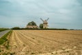 Moulin de pierre, old windmill in Hauville, France Royalty Free Stock Photo