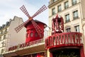 Moulin Rouge is a famous cabaret in red-light district of Paris, France Royalty Free Stock Photo