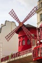 Moulin Rouge is a famous cabaret in red-light district of Paris, France Royalty Free Stock Photo