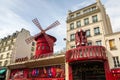 Moulin Rouge is a famous cabaret in red-light district of Paris, France Royalty Free Stock Photo