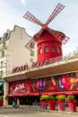 Moulin Rouge is a famous cabaret in red-light district of Paris, France Royalty Free Stock Photo