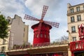 Moulin Rouge is a famous cabaret in red-light district of Paris, France Royalty Free Stock Photo