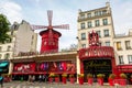 Moulin Rouge is a famous cabaret in red-light district of Paris, France Royalty Free Stock Photo