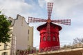 Moulin Rouge is a famous cabaret in red-light district of Paris, France Royalty Free Stock Photo