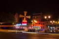 Moulin Rouge is a famous cabaret and thater in Paris, France