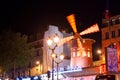 The Moulin Rouge by night in Paris, France. Moulin Rouge is a famous cabaret built in 1889, locating in the Paris red Royalty Free Stock Photo