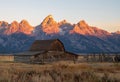 Moulton Barn and Teton Mountains as the sun rises Royalty Free Stock Photo