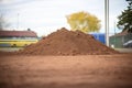 a mound of freshly dug loamy soil