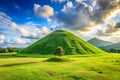 Mound Slope Green Grass and Mountain Royalty Free Stock Photo