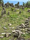 Mounds of stones set up by tourists in Beskid Maly in Poland in the area of the Czupel peak