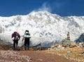 Mount Annapurna with two tourists Royalty Free Stock Photo