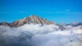 Mount Arera on the Orbie Alps above a sea of clouds Royalty Free Stock Photo