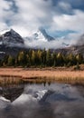 Mount Assiniboine with autumn forest reflection on Lake Magog at provincial park Royalty Free Stock Photo