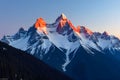 Mount Assiniboine in Canada during sunset, its peaks covered in snow with a striking alpenglow Royalty Free Stock Photo