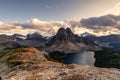 Mount Assiniboine with lake on Nublet peak in autumn forest on sunset at provincial park Royalty Free Stock Photo