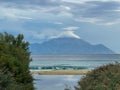 Mount Athos on a cloudy day, shrouded in mist. View from Sarti, Greece