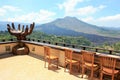 Mount Batur from terrace with large sculpture of open hands, Kintamani, Bali