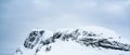 Mount Bitihorn peak in Beitostoelen Norway, covered in snow.