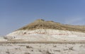 Mount Bokty is layered and multi-colored in the middle of the Kazakh steppe on a sunny spring day Royalty Free Stock Photo