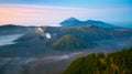 Mount Bromo while sunrise with fog Royalty Free Stock Photo