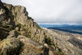 Mount Buffalo National Park, Victoria. Australia. Cliffs and Australian Alps views from The Horn picnic area. Mountains and clouds