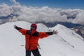 2014 07 Mount Elbrus, Russia: Man rejoices at the top of Mount Elbrus