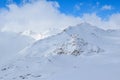 Mount Elbrus with ski slopes. Caucasus snowy mountains. Alpine skiing in the fresh air. skiers in the snow. mountain snowy landsca