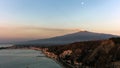 Mount Etna and the Giardini Naxos coastline at dawn Royalty Free Stock Photo