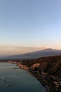 Mount Etna and the Giardini Naxos coastline at dawn Royalty Free Stock Photo