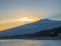 Mount Etna volcanic smoke at sunset. Sicily, Italy