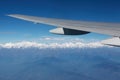 Mount Everest and airplane wing landscape viewed from aircraft window Royalty Free Stock Photo