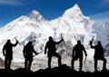 Mount Everest from Kala Patthar and silhouette of men