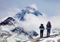 Mount Everest from Kala Patthar with two tourists