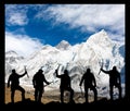 Mount Everest and silhouette of climbing men