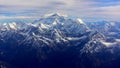 Mount Everest the world`s tallest mountain, rising above the other Himalayan mountains, Nepal