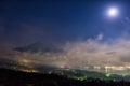 Mount Fuji with full moon and mist Royalty Free Stock Photo