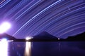 Mount Fuji, Lake Shojiko and star trails of winter stars