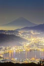 Mount Fuji with Suwako Lake at night seen from Mt. Takabochi