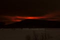 Mount Kachkanar, Rassia. Reflected fire from a gas pipeline explosion in the Perm region