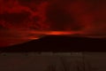 02.25.2020. Mount Kachkanar. Sverdlovsk. Rassia. Mount Kachkanar. Reflected fire from a gas pipeline explosion in the Perm region Royalty Free Stock Photo