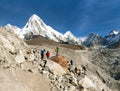 Mount Kala Patthar and mount Pumo Ri with tourists